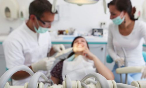 Dentists with the female patients