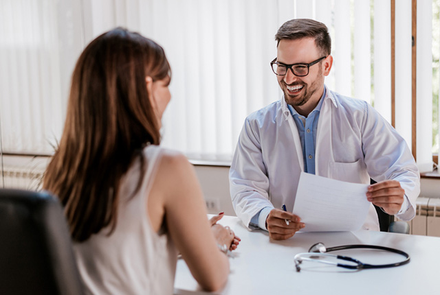 Doctor with female patient