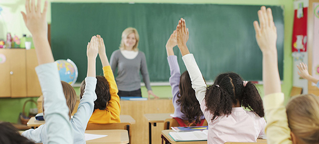 Children raising hands